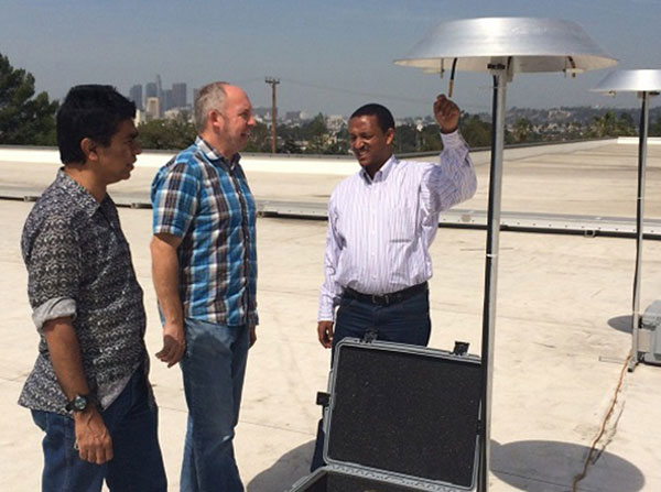 Addis Ababa University co-investigator Worku Tefera trains with USC and South Coast Air Quality Management District researchers during an exercise at an air monitoring station at USC in April 2013.