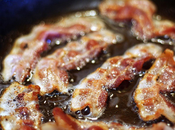 Bacon, hot dogs, cold cuts and beef jerky are listed in the same top carcinogen category as tobacco smoking and asbestos. (Photo/Jack Lyons)