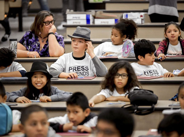 Students attend the Global Health Symposium for Kids.