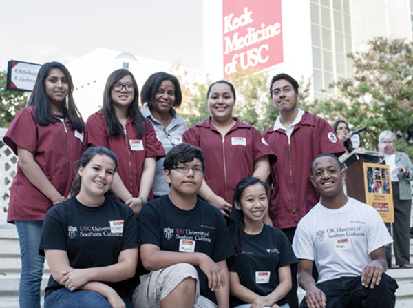 Med-COR Director Joyce Richey, back row center, introduced students from the program during the annual Oktoberfest event presented by the Keck School of Medicine of USC.