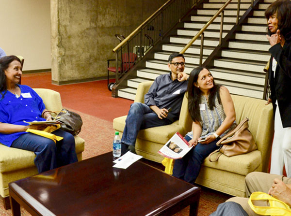 Keck Medical School of USC Parents Association executive board member Monique Fennoy, right, talks with parents before the Parents Symposium on Friday, Oct. 23, at Mayer Auditorium on the Health Sciences Campus.