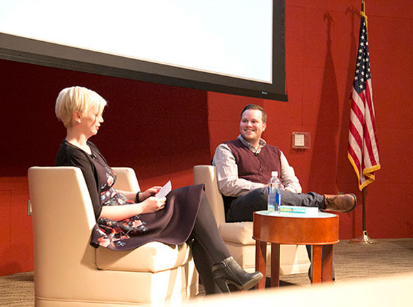 USC Norris Medical Library clinical and research librarian Lynn Kysh, left, talks with author John Corey Whaley during a Visions and Voices event on Jan. 25 at Aresty Auditorium on the Health Sciences Campus.