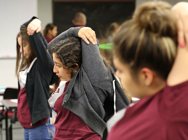 HIgh school students interact with volunteers from the Primary Care Physician Assistant Program during one of the PA Program's monthly Pipeline Program events.