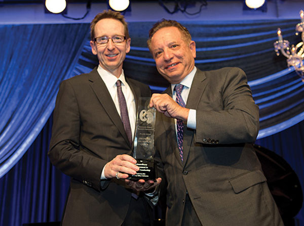 Provost Michael Quick, left, and Keck School of Medicine Dean Carmen A. Puliafito, pose at the UKRO benefit gala March 18 at the Beverly Hilton.