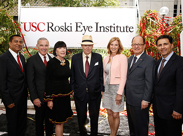 From left, Rohit Varma, Edward Roski, Gayle Roski, Robert Day, Niki Nikias, USC President C.L. Max Nikias and Mark Humayun pose during a celebration of the USC Roski Eye Institute naming gift on April 28 at the Health Sciences Campus.