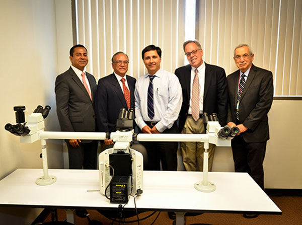 From left, Rohit Varma, Narsing Rao, Mark Humayun, Michael Selsted and Ronald Green during the grand opening of the Ophthalmic Molecular and Immuno-Pathology Lab at the USC Gayle and Edward Roski Eye Institute, April 8 on the Health Sciences Campus.