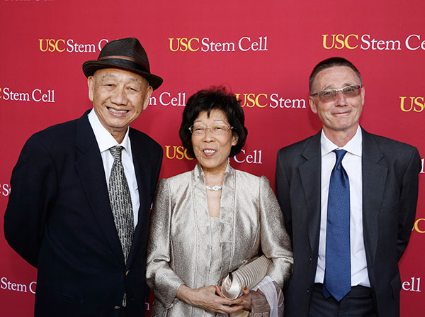 From left, philanthropists Kin-Chung and Amy Choi with Andy McMahon, chair of the executive committee of USC Stem Cell (Photo by Steve Cohn