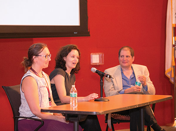 From left, Rebecca Trotzky-Sirr and Welmoed Kirsten van Deen participate in a panel discussion with Steve Asch, right, during the inaugural Gehr Family Center for Implementation Science Guest Speaker Series.