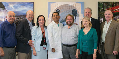 From left, Richard H. Zeiss, John H. Reith, Zea Borok, Rohit Varma, Michael Gurevitch, Anne Hormann, Gene E. Gregg and Thomas Buchanan.