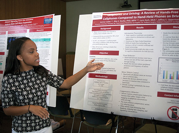 Janine Cadet speaks during the sixth annual Bridging the Gaps Summer Research Poster Day on Aug. 4 in the Broad CIRM Center.