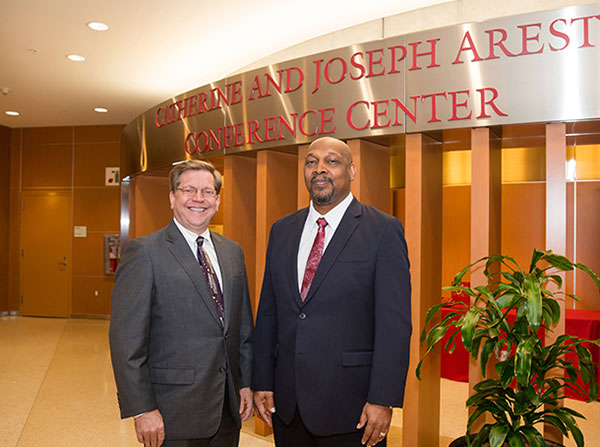 Stephen B. Gruber and John D. Carpten are seen before the USC Norris Ambassadors Friends and Family Luncheon, held Sept. 29 at the Aresty Auditorium on the Health Sciences Campus.