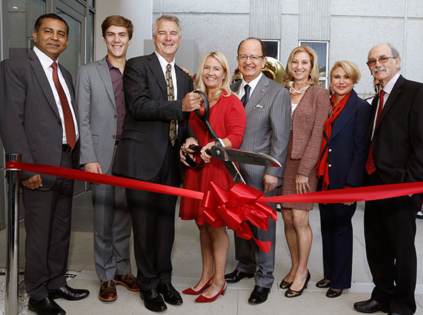 (left to right) Keck School of Medicine Dean Rohit Varma, MD, MPH, Sean Stevens, USC Trustees and benefactors Mark and Mary Stevens, USC President C. L. Max Nikias, wife Niki Nikias, philanthropist Ghana Irani, and Arthur Toga, PhD cut the ribbon during the grand opening of the University of Southern California Stevens Hall for Neuroimaging on Nov. 17.(Photo/Steve Cohn)