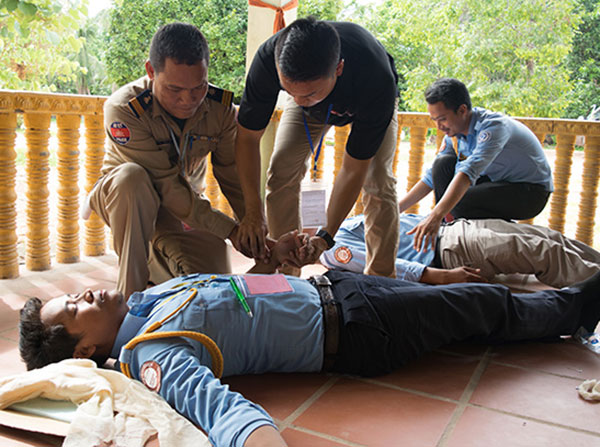 A Cambodian police officer receives basic emergency services training in Cambodia.