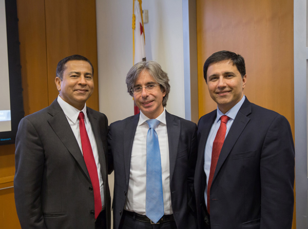 From left, Rohit Varma, Gianluca Lazzi and Mark Humayun are seen after the Dean’s Distinguished Lecturer Series, held Dec. 12, 2016 on the Health Sciences Campus.