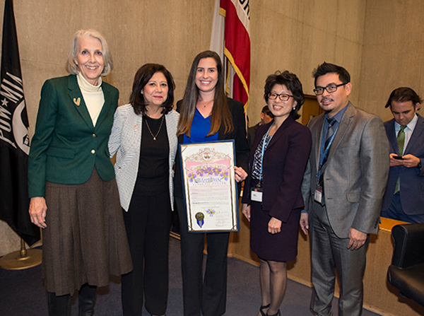 Kate Wilber, PhD, Supervisor Hilda Solis, Allison Young, Bella Chan and Richard Franco stand with the scroll presented to the Los Angeles County Elder Abuse Forensic Center at the Board of Supervisors Meeting on Dec. 6, 2016.