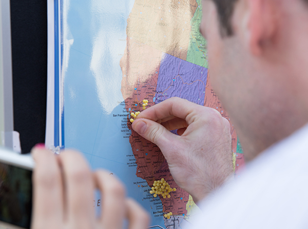 Medical school students mark where they will be completing their residencies.