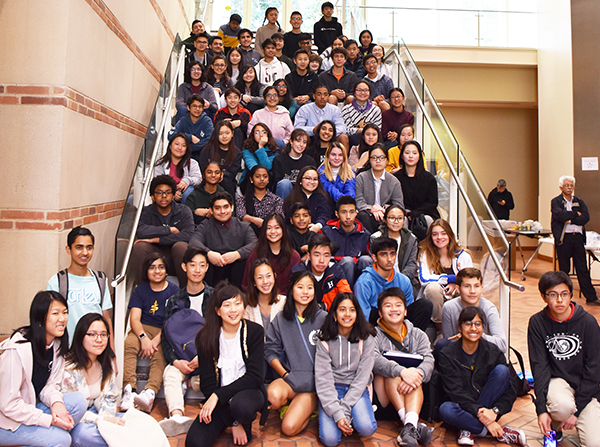 Dozens of students sitting on a staircase at 2019 Los Angeles Brain Bee