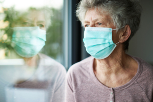 istock image of a woman wearing a face mask