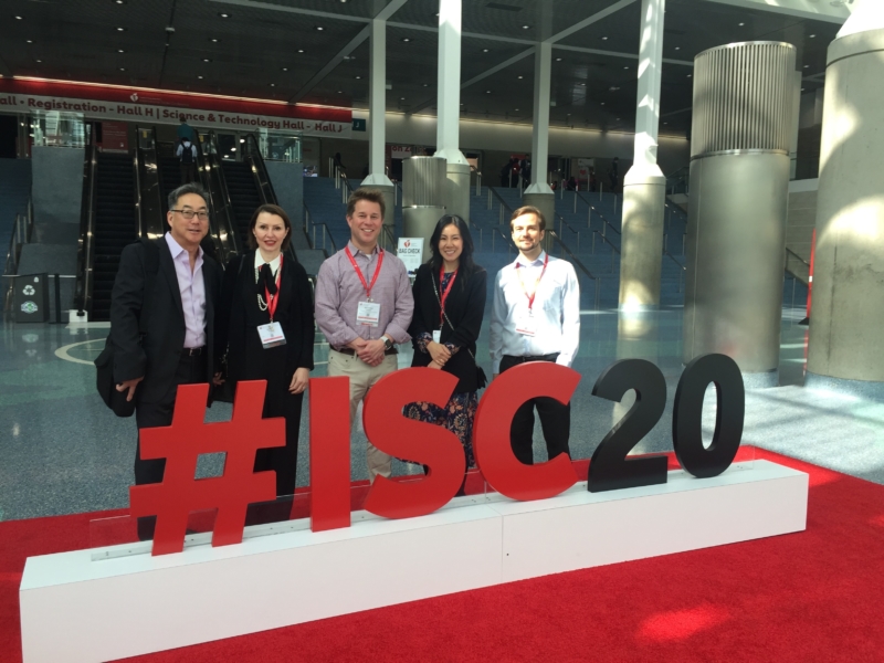 People standing behind an #ISC2020 sign - 2