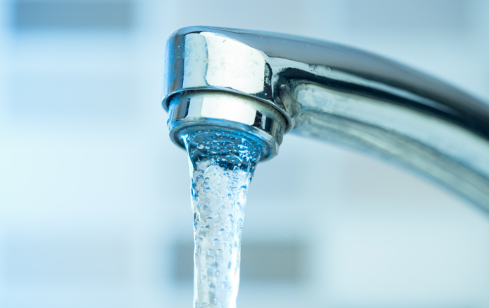 Pouring water from a Faucet