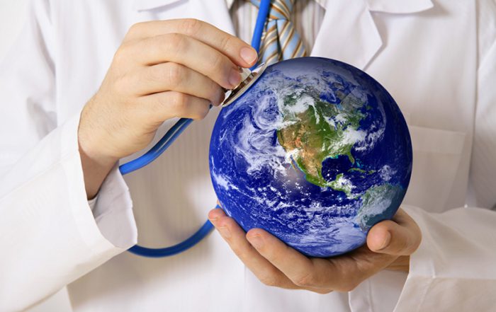 Photo of Globe with a doctor placing stethoscope on it