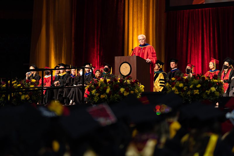 Dextor Holland, USC PhD  graduate and lead singer of the Offspring, delivers commencement  speech at Galen Center.