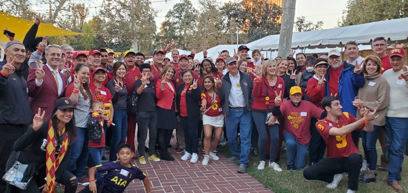 Dean Meltzar and President Carol Folt pictured with group of Keck School Alumni