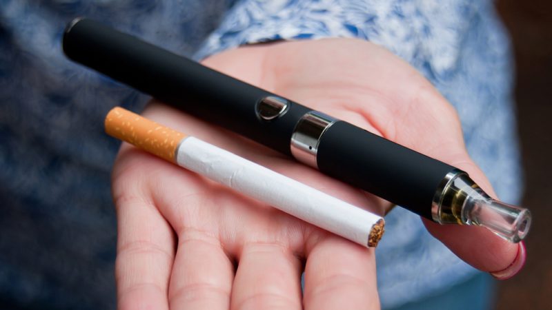 closeup of hand of woman with e-cigarette